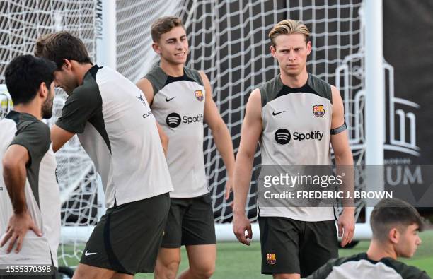 Barcelona's Frankie de Jong and teammates attend a training session at the Los Angeles Coliseum in Los Angeles, California on July 25 one day before...