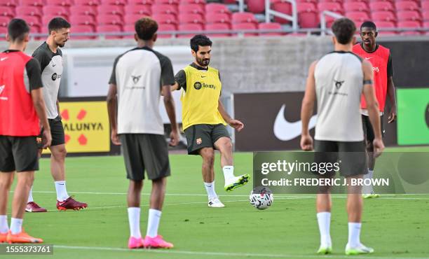 Barcelona new signing Ilkay Gundogan and teammates attend a training session at the Los Angeles Coliseum in Los Angeles, California on July 25 one...