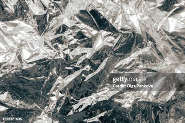 texture of metallized foil - carta stagnola foto e immagini stock