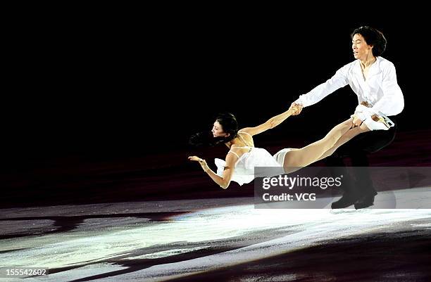 Pairs gold medalists Qing Pang and Jian Tong of China perform during the Cup of China ISU Grand Prix of Figure Skating 2012 at the Oriental Sports...