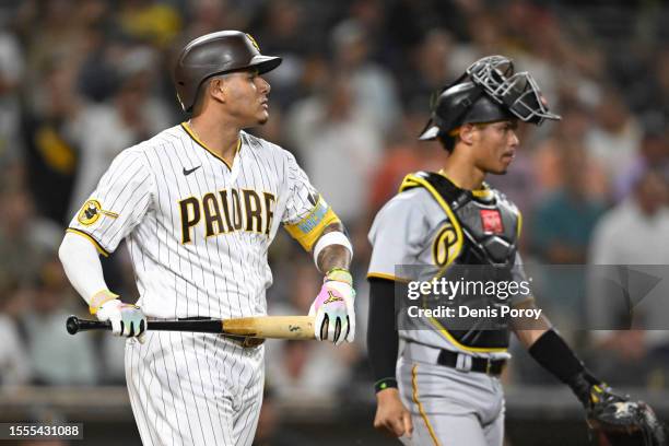 Manny Machado of the San Diego Padres looks to the mound after being hit with a pitch during the seventh inning of a baseball game against the...