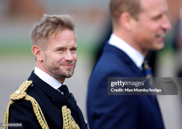 Commander Rob Dixon accompanies Prince William, Prince of Wales as he visits RAF Coningsby on November 18, 2022 in Coningsby, England.