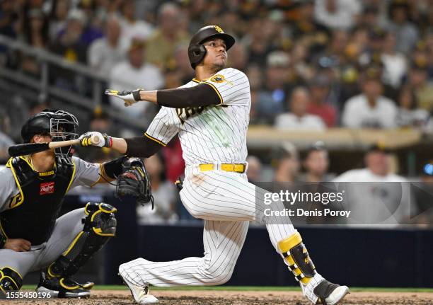 Juan Soto of the San Diego Padres hits a solo home run during the seventh inning of a baseball game against the Pittsburgh Pirates July 25, 2023 at...