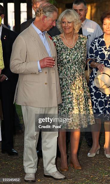 Prince Charles, Prince of Wales and Camilla, Duchess of Cornwall attend a garden barbeque after arriving in Longreach on November 05, 2012 in...