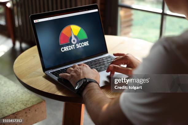 people using laptop and credit score concept on screen - credit score stock pictures, royalty-free photos & images