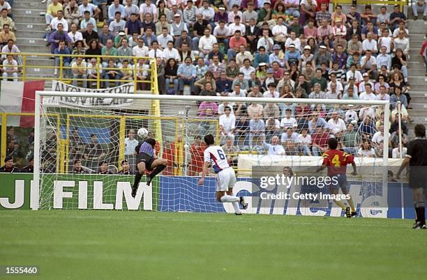 Davor Jozic of Yugoslavia scores during the World Cup match against Colombia at the Dall''Ara Stadium in Bologna, Italy. Yugoslavia won the match...