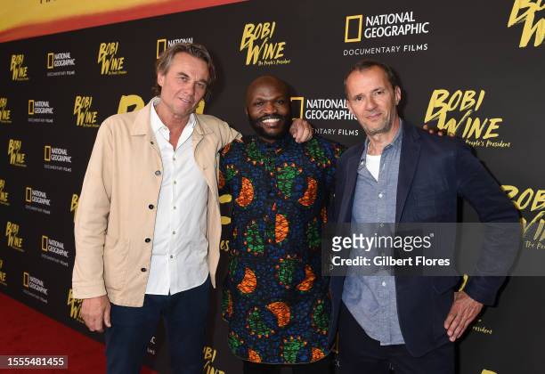 Christopher Sharp, Moses Bwayo and John Battsek at the premiere of National Geographic's "Bobi Wine: The People's President" held at The Wallis...
