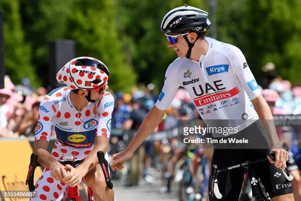 Giulio Ciccone of Italy and Team Lidl-Trek - Polka Dot Mountain Jersey and Tadej Pogacar of Slovenia and UAE Team Emirates - White Best Young Rider...