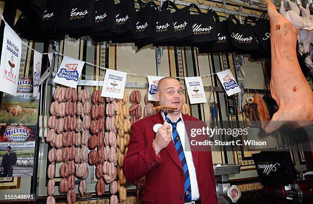 Al Murray attends a photocall to launch British Sausage Week at Allen's of Mayfair, London's oldest butcher shop on November 5, 2012 in London,...