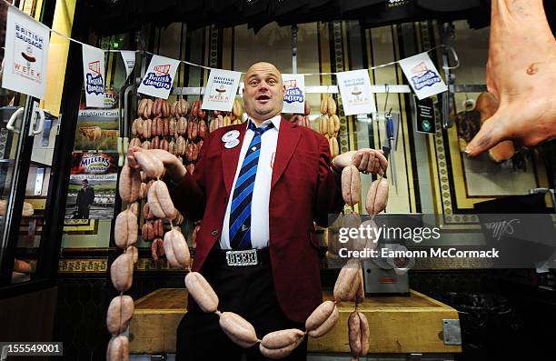 Al Murray attends a photocall to launch British Sausage Week on November 5, 2012 in London, England.