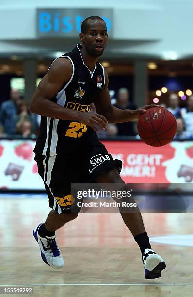 David Weaver of Ludwigsburg runs with the ball during the Beko BBL basketball match between Eisbaeren Bremerhaven and Nackar RIESEN Ludwigsburg at...