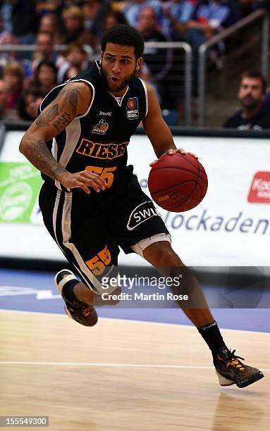 Joshua Jackson of Ludwigsburg runs with the ball during the Beko BBL basketball match between Eisbaeren Bremerhaven and Nackar RIESEN Ludwigsburg at...