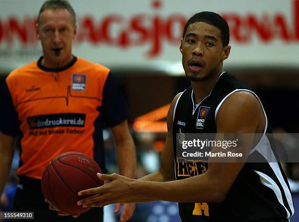 Ivan Elliot of Ludwigsburg runs with the ball during the Beko BBL basketball match between Eisbaeren Bremerhaven and Nackar RIESEN Ludwigsburg at the...