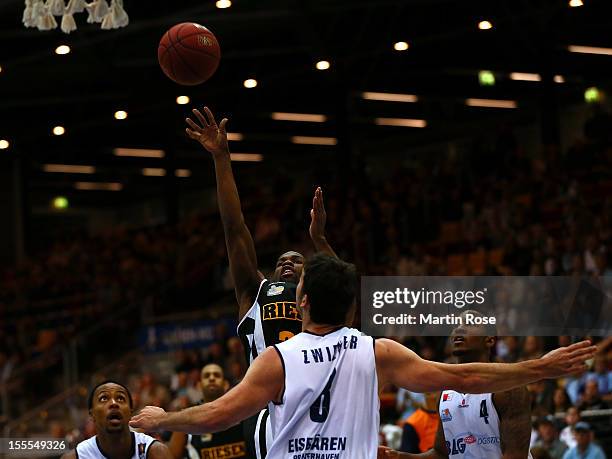 David Weaver of Ludwigsburg throws the ball during the Beko BBL basketball match between Eisbaeren Bremerhaven and Nackar RIESEN Ludwigsburg at the...
