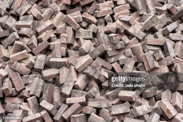 many paving stones in a big heap - bricka stock pictures, royalty-free photos & images