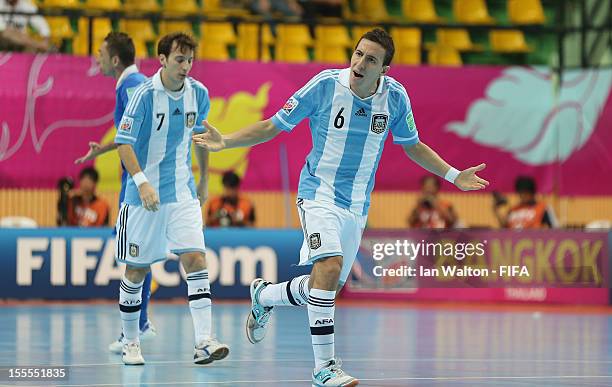 Maximiliano Rescia of Argentina celebrates scoring the first goal during the FIFA Futsal World Cup Thailand 2012, Group D match between Argentina and...