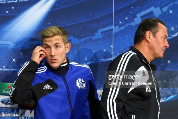 Lewis Holtby and head coach Huub Stevens of FC Schalke 04 attend the press conference at the Veltins Arena ahead of the UEFA Champions League group B...