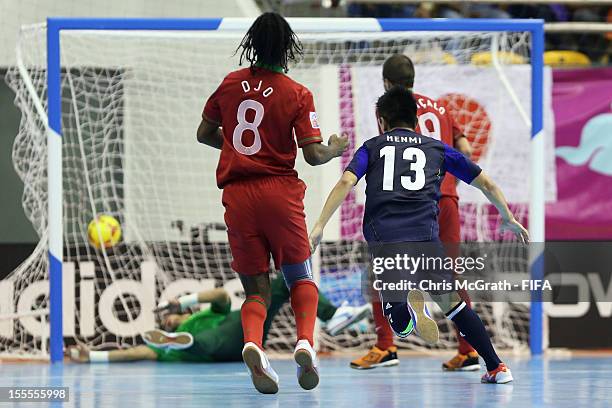 Katsutoshi Henmi of Japan scores the fifth goal against Portugal during the FIFA Futsal World Cup, Group C match between Portugal and Japan at Korat...