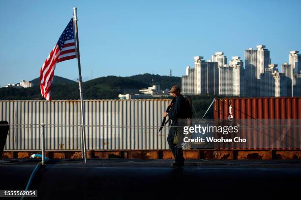 Crew parols on the deck of U.S. Ballistic Missile Submarine USS Kentucky anchored in Busan Naval Base on July 19, 2023 in Busan, South Korea. U.S....