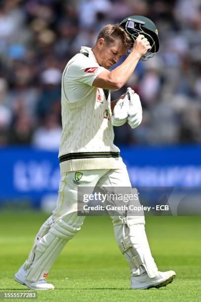 David Warner of Australia walks off after being dismissed by Chris Woakes of England during Day One of the LV= Insurance Ashes 4th Test Match between...