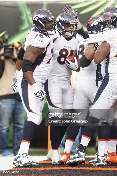 Joel Dreessen of the Denver Broncos celebrates a touchdown during the game against the Cincinnati Bengals at Paul Brown Stadium on November 4, 2012...