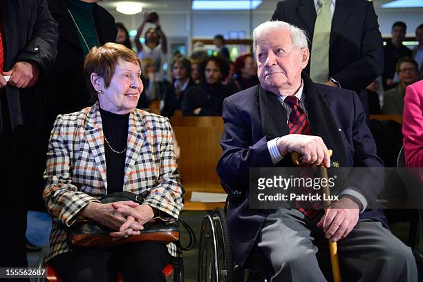 Former German Chancellor Helmut Schmidt and his partner Ruth Loah attend a ceremony at the Kirchdorf/Wilhelmsburg Gymnasium high school on the day...