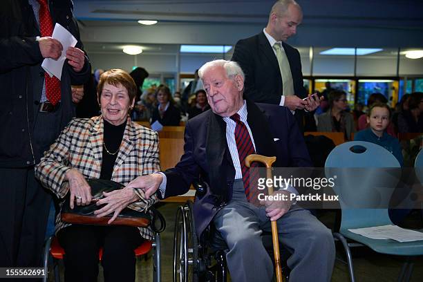 Former German Chancellor Helmut Schmidt and his partner Ruth Loah attend a ceremony at the Kirchdorf/Wilhelmsburg Gymnasium high school on the day...