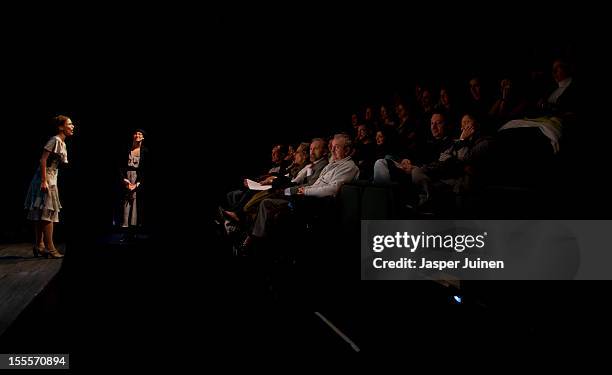 The public watches as actress Maria Pastor plays alongside Alicia Gonzalez in the 'Tres Anos' theater show, a show that plays in the 1930's between...