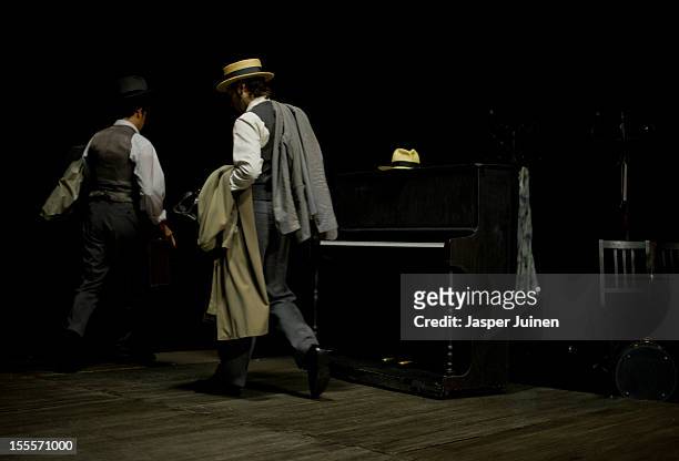 Actors leave the stage after playing in the 'Tres Anos' theater show, a show that plays in the 1930's between the first and Second World War, at the...