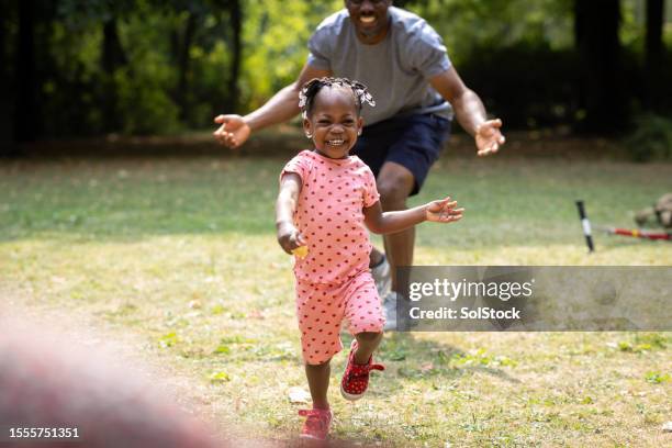 Chasing Toddler Riley 191 Mother Chasing Toddler Stock Photos, High-Res Pictures, and Images ...