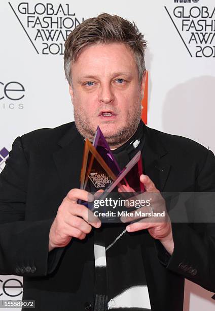 Rankin poses in the awards room at the WGSN Global Fashion Awards at The Savoy Hotel on November 5, 2012 in London, England.