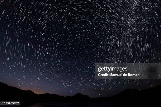 Meteors along the Milky Way en the sky on July 18, 2023 in Leon, Spain. The annual meteor shower Perseids can be seen between the days of July 17 to...