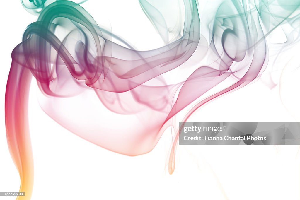 Colorful Smoke Against A White Background