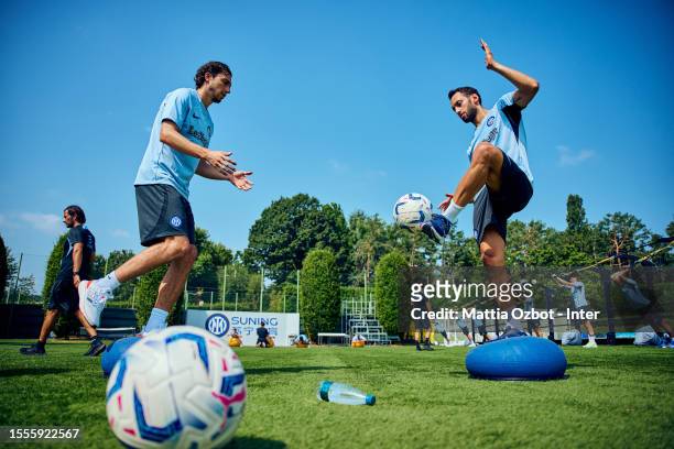 Darmian Matteo of FC Internazionale, Hakan Calhanoglu of FC Internazionale in action during the FC Internazionale training session at the club's...