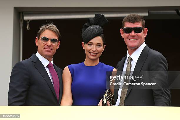 Shane Warne, Erica Packer and James Packer pose for a photo in the birdcage on Melbourne Cup Day at Flemington Racecourse on November 6, 2012 in...
