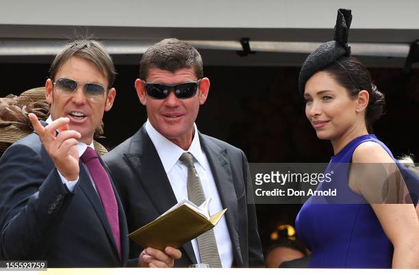 Shane Warne, James Packer and Erica Packer are seen inside the Crown marquee at the Melbourne Cup at Flemington Racecourse on November 6, 2012 in...