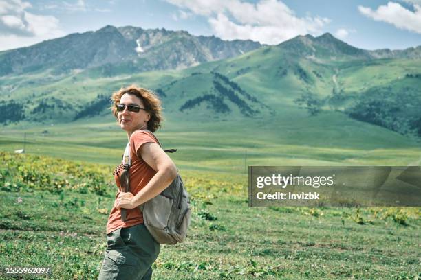 45-years old female tourist is liking in tien shan mountains - 45 49 år bildbanksfoton och bilder