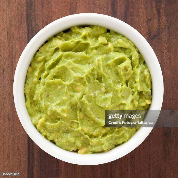 mashed avocado - avocado stock pictures, royalty-free photos & images
