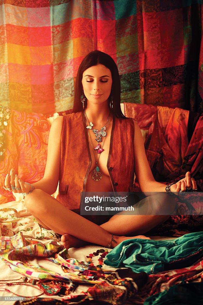 Young hippie woman meditating