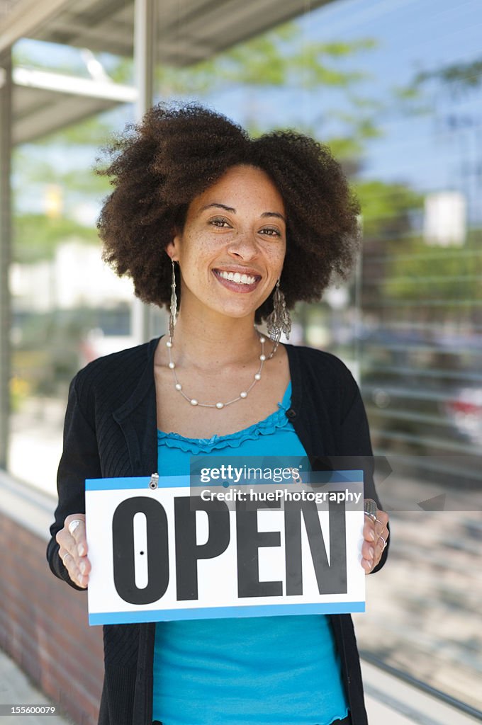Woman with Open Sign