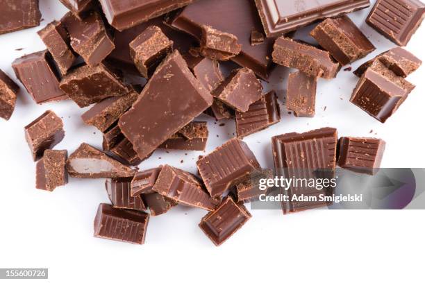 chopped chocolate pieces isolated on white - dark chocolate on white stock pictures, royalty-free photos & images