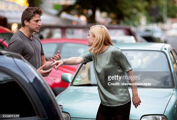 traffic accident - man and woman and car stock pictures, royalty-free photos & images