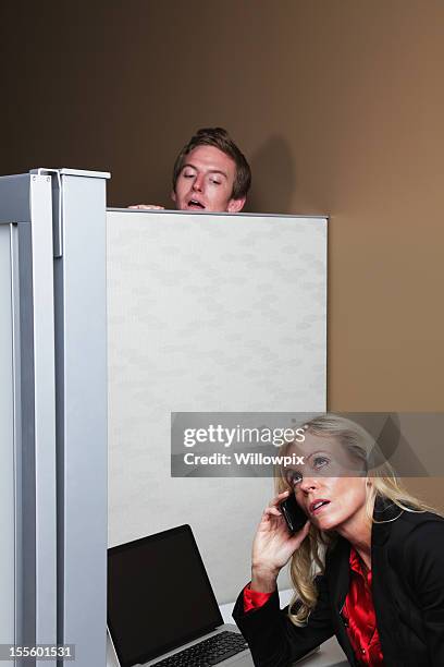 man eavesdropping over cubicle wall - eavesdropping stock pictures, royalty-free photos & images