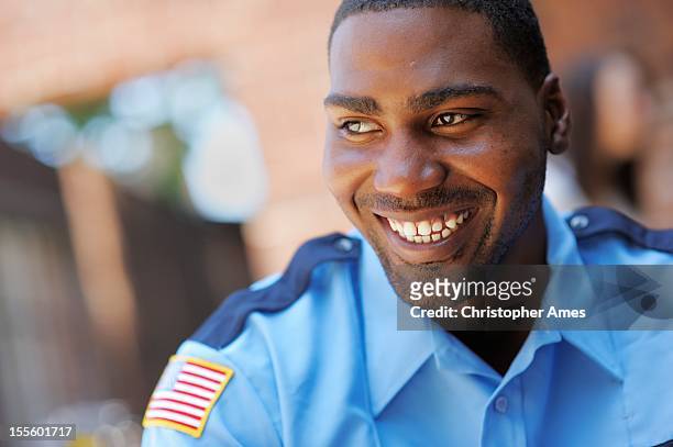 felice american security officer - security guard foto e immagini stock