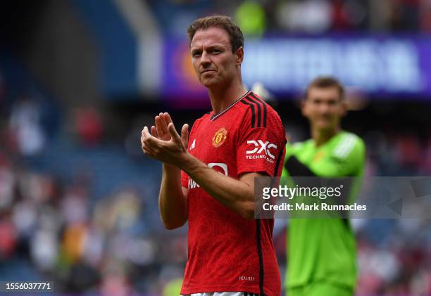 Jonny Evans of Manchester United applauds the crowd during the pre-season friendly match between Manchester United and Olympique Lyonnais at BT...