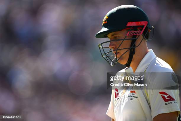 Cameron Green of Australia walks off after being dismissed by Chris Woakes of England with teammates during Day One of the LV= Insurance Ashes 4th...