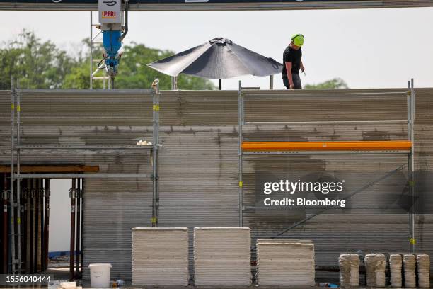 Printer operated by PERI 3D Construction GmbH prints i.tech 3D concrete, developed by Heidelberg Materials AG, at the construction site of a data...