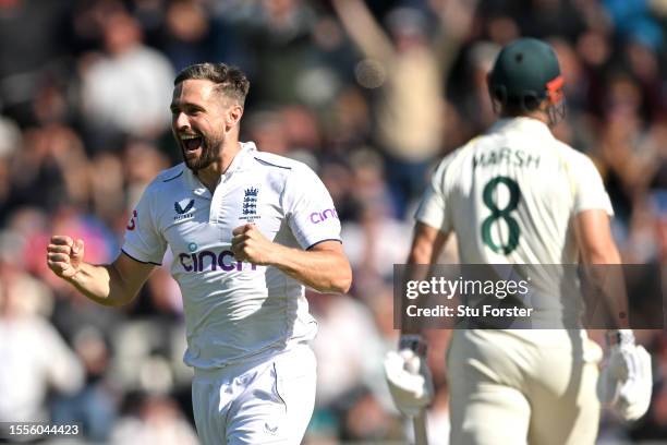 Chris Woakes of England celebrates taking the wicket of Mitchell Marsh of Australia during Day One of the LV= Insurance Ashes 4th Test Match between...