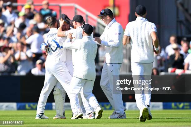 Chris Woakes of England congratulates Jonny Bairstow of England after he caught Mitchell Marsh of Australia during Day One of the LV= Insurance Ashes...