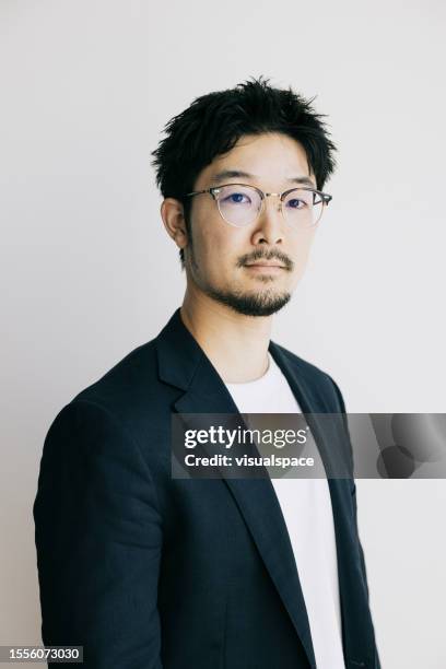 headshot of focused young asian businessman, smart casual outfit. - smart casual stock pictures, royalty-free photos & images